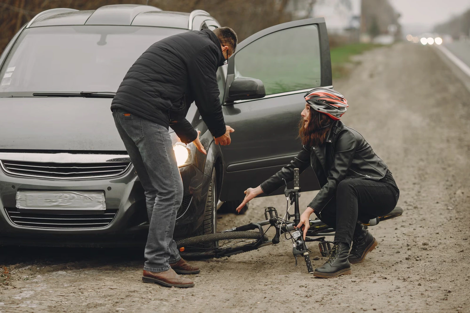 A damaged bicycle at the scene of a crash