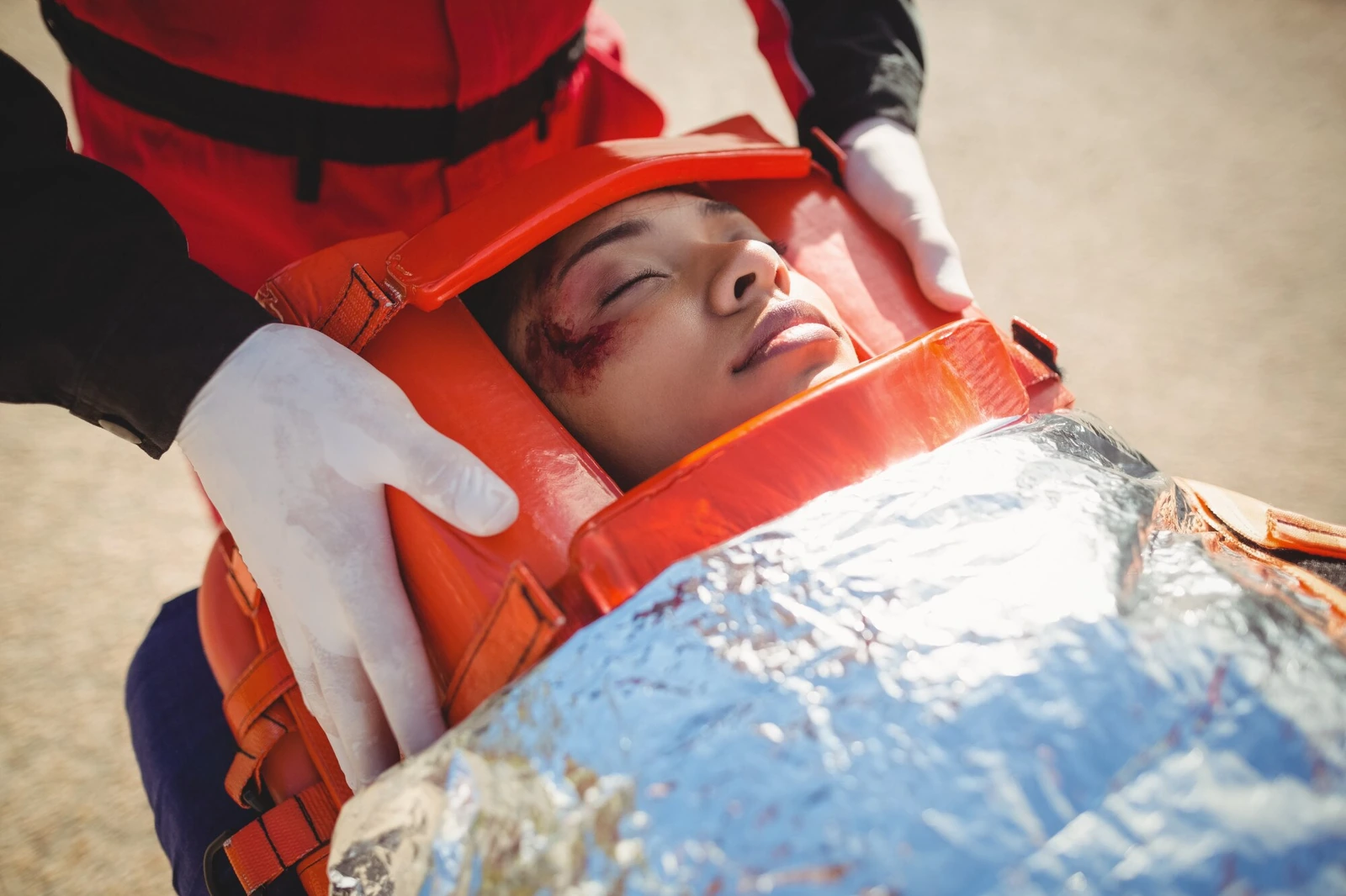 A doctor reviewing a patient's injury after a car accident
