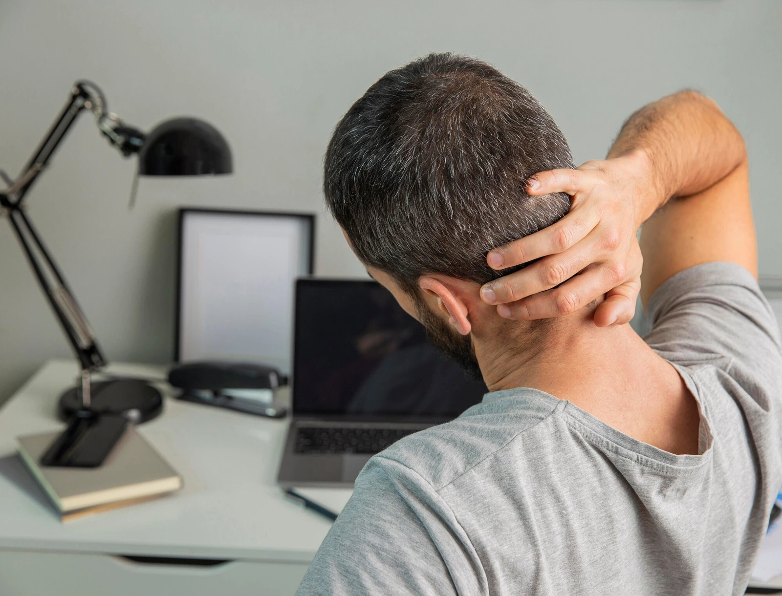 A physician assessing a patient's range of motion